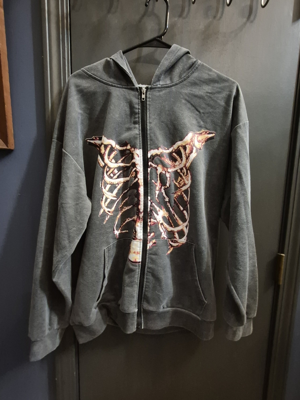 Kids Black Graphic Zip-Up Hoodie with Ribcage Print